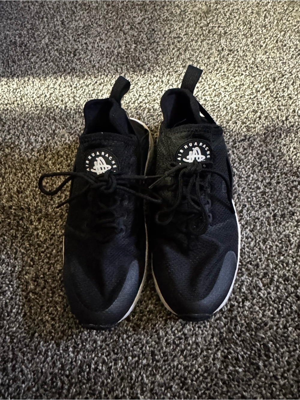 Nike Black womans Athletic Sneakers with White Accents